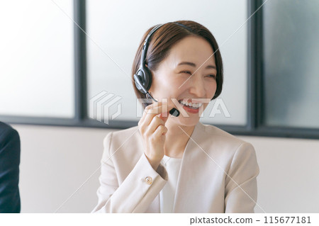 Female call center operators 115677181