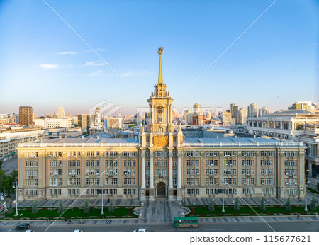 Yekaterinburg City Administration or City Hall and Central square at summer evening. Evening city in the summer sunset, Aerial View. Yekaterinburg City Administration or City Hall and Central square at summer evening. Evening city in the summer sunset, Aerial View. 115677621
