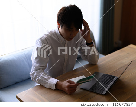 Men seeing passbooks 115677837