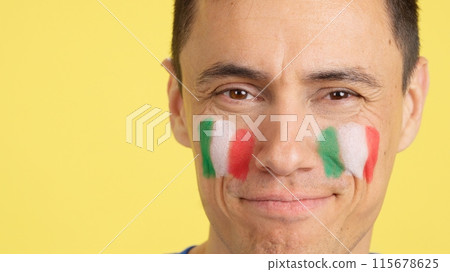 Close up of a man supporting italian team Close up of a man supporting italian team 115678625