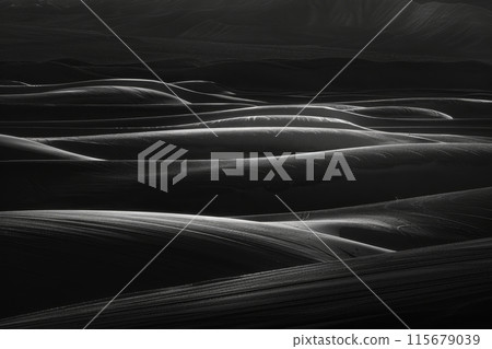 A black and white photo of a desert landscape with a few small hills A black and white photo of a desert landscape with a few small hills 115679039