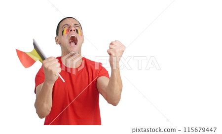 Man cheering for Belgium screaming and waving a national flag Man cheering for Belgium screaming and waving a national flag 115679447