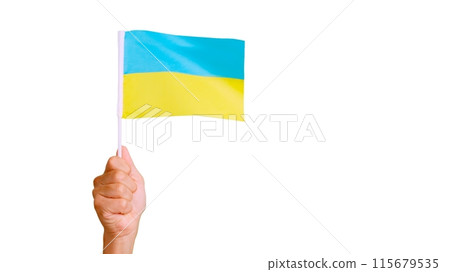 Wind waving a ukrainian pennant holding by a person 115679535