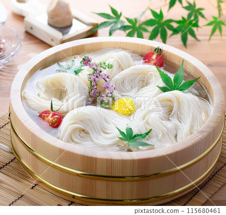 Summer image of somen noodles served in a somen tub Summer image of somen noodles served in a somen tub 115680461