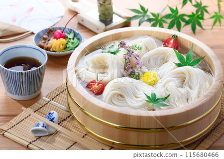 Summer image of somen noodles served in a somen tub Summer image of somen noodles served in a somen tub 115680466