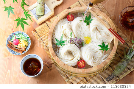 Summer image of somen noodles served in a somen tub (aerial view) Summer image of somen noodles served in a somen tub (aerial view) 115680554