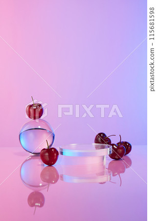 The blank showcase pedestal of glass placed in the middle of table, decorated beside with flat lay cherries and a crystal ball, against colorful background. Space for presentation and adding text The blank showcase pedestal of glass placed in the middle of table, decorated beside with flat lay cherries and a crystal ball, against colorful background. Space for presentation and adding text 115681598