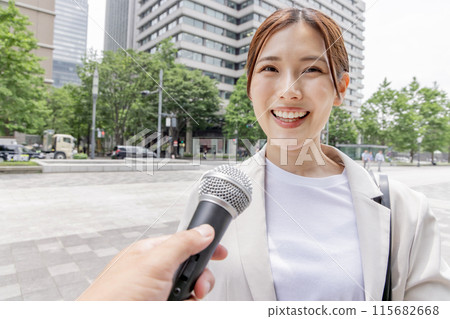 Middle-aged woman interviewed (interview / Mike) 115682668