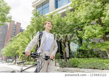 Commuting woman bicycle Commuting woman bicycle 115683122