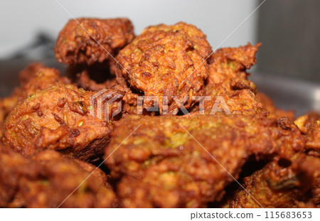 A picture of pakora with selective focus A picture of pakora with selective focus 115683653