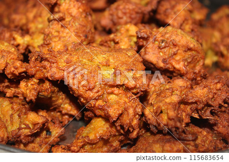 A picture of pakora with selective focus A picture of pakora with selective focus 115683654