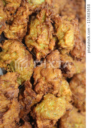 A picture of pakora with selective focus A picture of pakora with selective focus 115683658