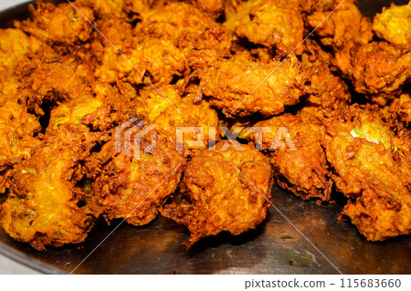 A picture of pakora with selective focus A picture of pakora with selective focus 115683660