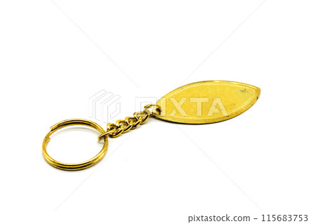 A picture of golden earrings with white background 115683753