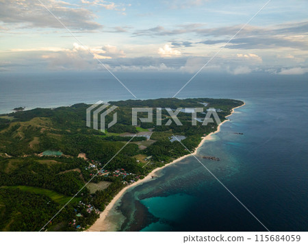 Aerial view of Island with sandy beach. Agmanic, Santa Fe, Tablas, Romblon. Philippines. Aerial view of Island with sandy beach. Agmanic, Santa Fe, Tablas, Romblon. Philippines. 115684059