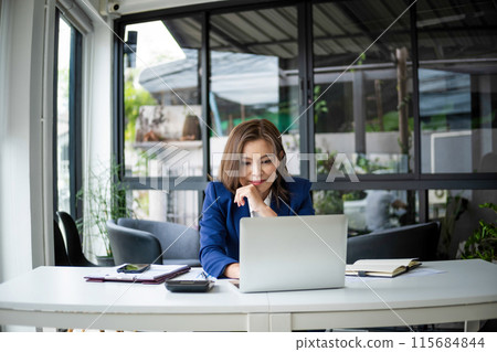 asian business woman working in office asian business woman working in office 115684844