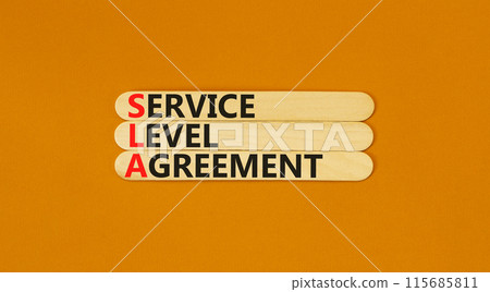 SLA service level agreement symbol. Concept words SLA service level agreement on beautiful wooden stick. Beautiful orange background. Business SLA service level agreement concept. Copy space. SLA service level agreement symbol. Concept words SLA service level agreement on beautiful wooden stick. Beautiful orange background. Business SLA service level agreement concept. Copy space. 115685811