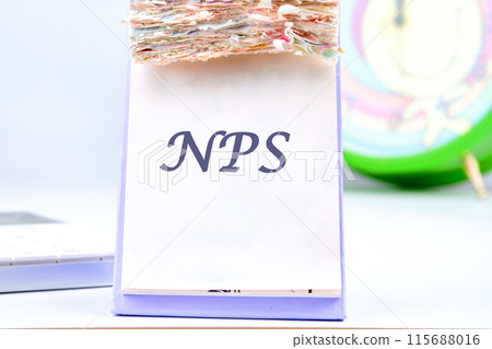 Concept word NPS Net Promoter Score the inscription on the calendar with tear-off leaves 115688016