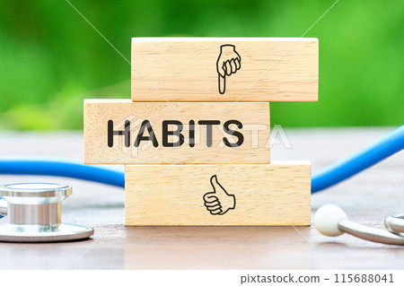 Concept. Copy space. Text HABITS on wooden bars next to the stethoscope 115688041