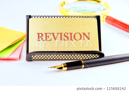 Concept Word REVISION on the golden card 115688142