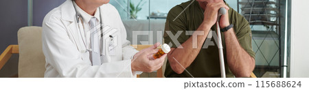 Doctor Prescribing Pills To Patient Doctor Prescribing Pills To Patient 115688624