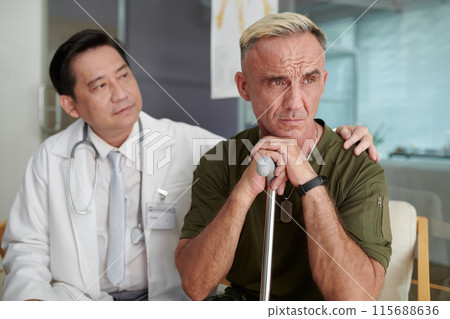 Soldier With Cane Getting Disability Soldier With Cane Getting Disability 115688636