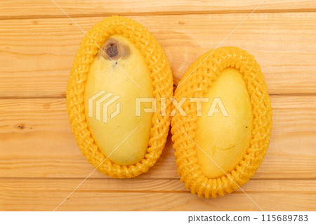 Mango fruit with mold, mould is one of the structures that certain fungi can form, formation of spores containing fungal secondary metabolites, decaying lemon, dry, discolored, disambiguation. 115689783