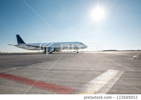 Airplane during taxiing to airport runway. 115689852