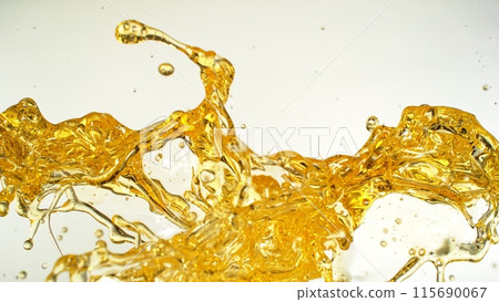 Sunflower Oil Splashing on White Background. Sunflower Oil Splashing on White Background. 115690067