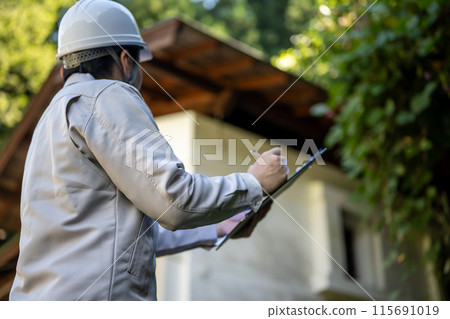 Man in work clothes / Construction and construction related Man in work clothes / Construction and construction related 115691019
