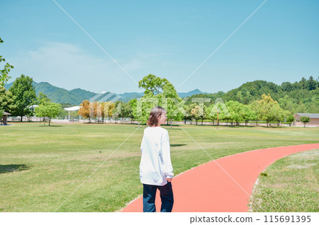 Outdoors, refreshing woman, park, spring, health, exercise 115691395