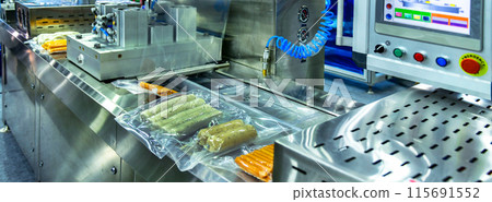 High-performance machines are wrapping processed fresh food products, pork, sausages.food production lines on conveyor belts, food production industry 115691552