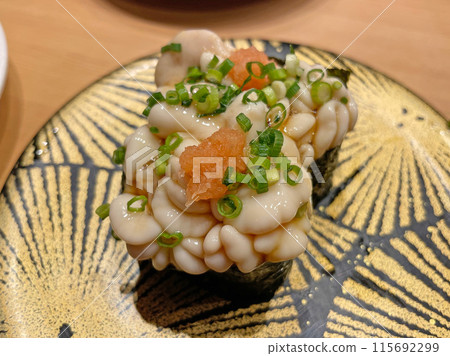 Cod roe gunkan maki, a winter delicacy from Hokkaido, available at conveyor belt sushi restaurants. Cod roe gunkan maki, a winter delicacy from Hokkaido, available at conveyor belt sushi restaurants. 115692299