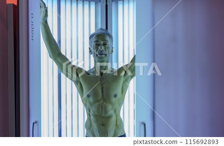 Tanning salon senior man 115692893
