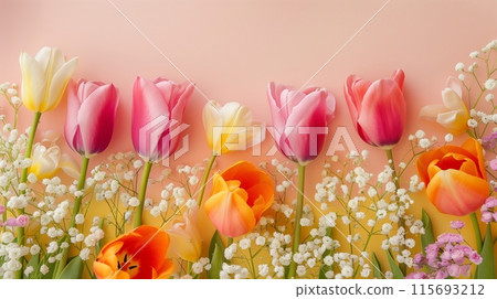 Arrangement of colorful tulips and small white flowers 115693212
