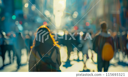 A crowded city centre with a diverse crowd in soft afternoon light 115693321