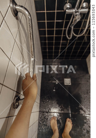 tactile experience of engaging with water, sensory aspect of touching cold shower handle tactile experience of engaging with water, sensory aspect of touching cold shower handle 115693843