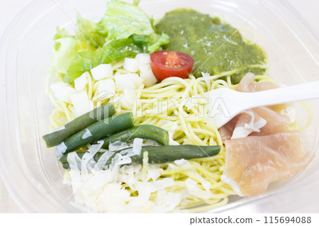 Delicious cold pasta with basil sauce 115694088