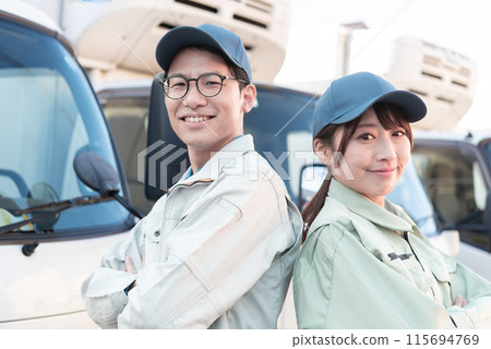 Two male and female truck drivers 115694769