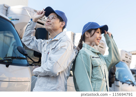 Two male and female truck drivers 115694791