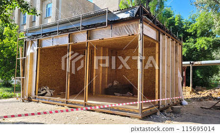 Construction of a street shopping pavilion for a store, all stages of construction, detailed overview Construction of a street shopping pavilion for a store, all stages of construction, detailed overview 115695014
