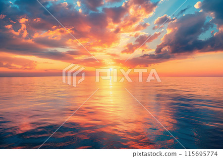 Breathtaking sunset over the ocean with vibrant orange and blue sky 115695774
