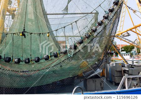 Traditional old german fishing cutter boats moored Neuharlingersiel harbor Wadden sea East Frisia Northern Germany. Commercial fish crab shrimp trawler beam trawl nets North Sea small port city Traditional old german fishing cutter boats moored Neuharlingersiel harbor Wadden sea East Frisia Northern Germany. Commercial fish crab shrimp trawler beam trawl nets North Sea small port city 115696126