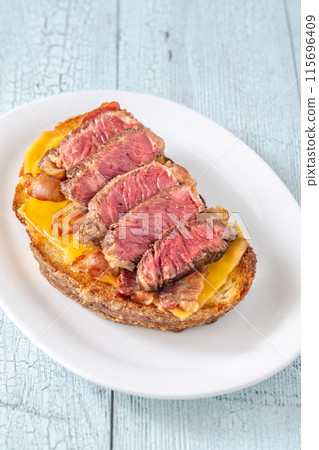 Bacon and steak bruschetta 115696409