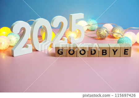 Goodbye 2025 word alphabet letters on wooden background 115697426