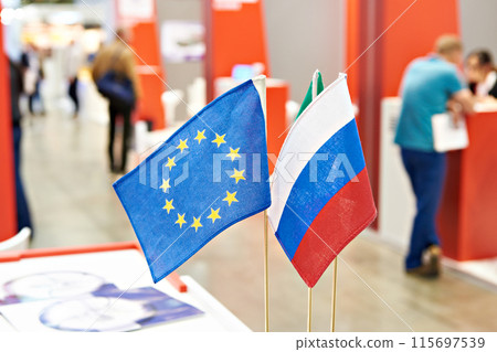 Flags of Russia and European Union on exhibition Flags of Russia and European Union on exhibition 115697539