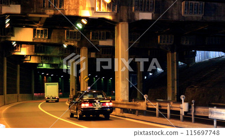 Tokyo scenery: A dark road passing under the bridge of the Metropolitan Expressway Tokyo scenery: A dark road passing under the bridge of the Metropolitan Expressway 115697748