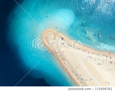Aerial view of blue sea, sandbank, white sandy beach in summer Aerial view of blue sea, sandbank, white sandy beach in summer 115698762