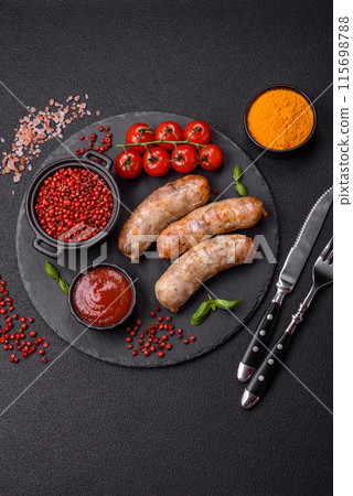 Baked chicken or pork sausages, salt, spices and herbs 115698788
