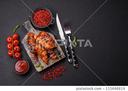 Delicious chicken fillet sliced and baked with teriyaki sauce 115698819